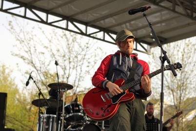 Tomas Kalnoky, lead singer of the band Streetlight Manifesto, jams out on his guitar at Rose Rock 2012. (Photo Credit: Kelly Pfeister)