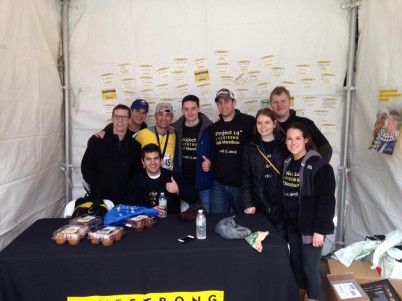 Michael Bellizzi with friends and family after the half marathon. COURTESY OF MICHAEL BELLIZZI