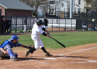Joseph Carconne connects on a pitch in the first inning