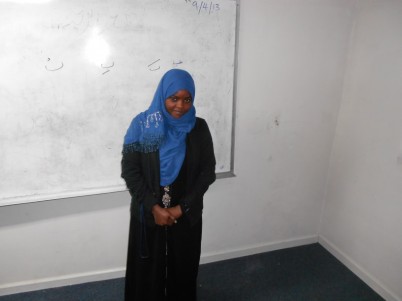Ms. Abdullah, the instructor of the first level class. MOUZAWAR CHAMI. 